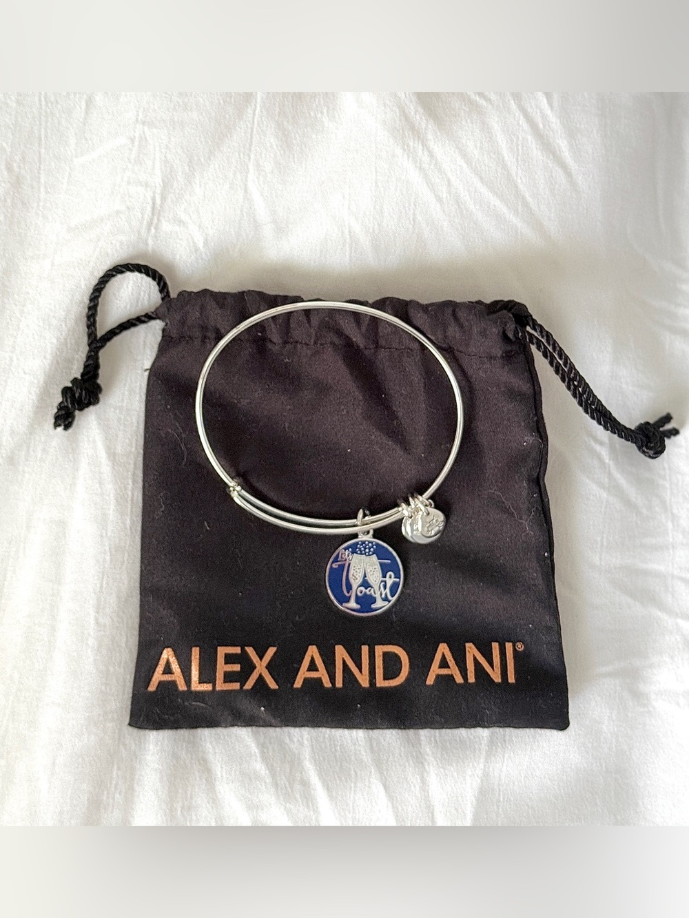 Alex and Ani Silver Bangle with “Let’s Toast” Champagne Flute Charm